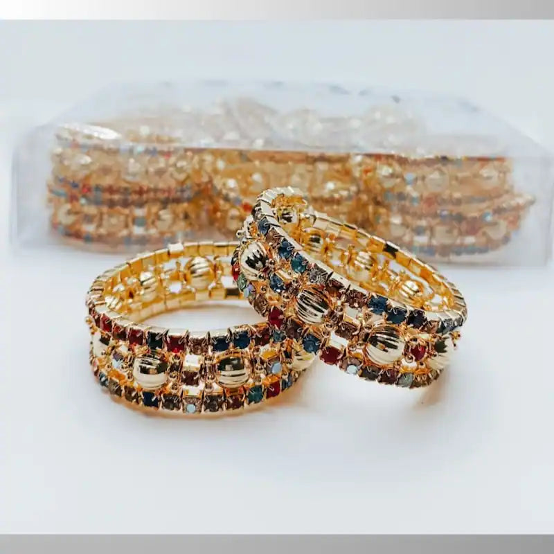 Elegant Gold-Tone Bangle Set with Multi-Colored Gemstones