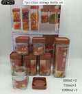 7-Piece Embossed Glass Storage Bottle Set – Airtight Kitchen Jars (500ml, 750ml, 1300ml)